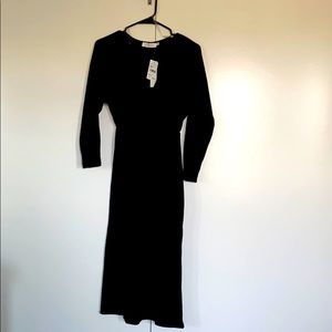 Cozy, knit long sleeve, black dress.